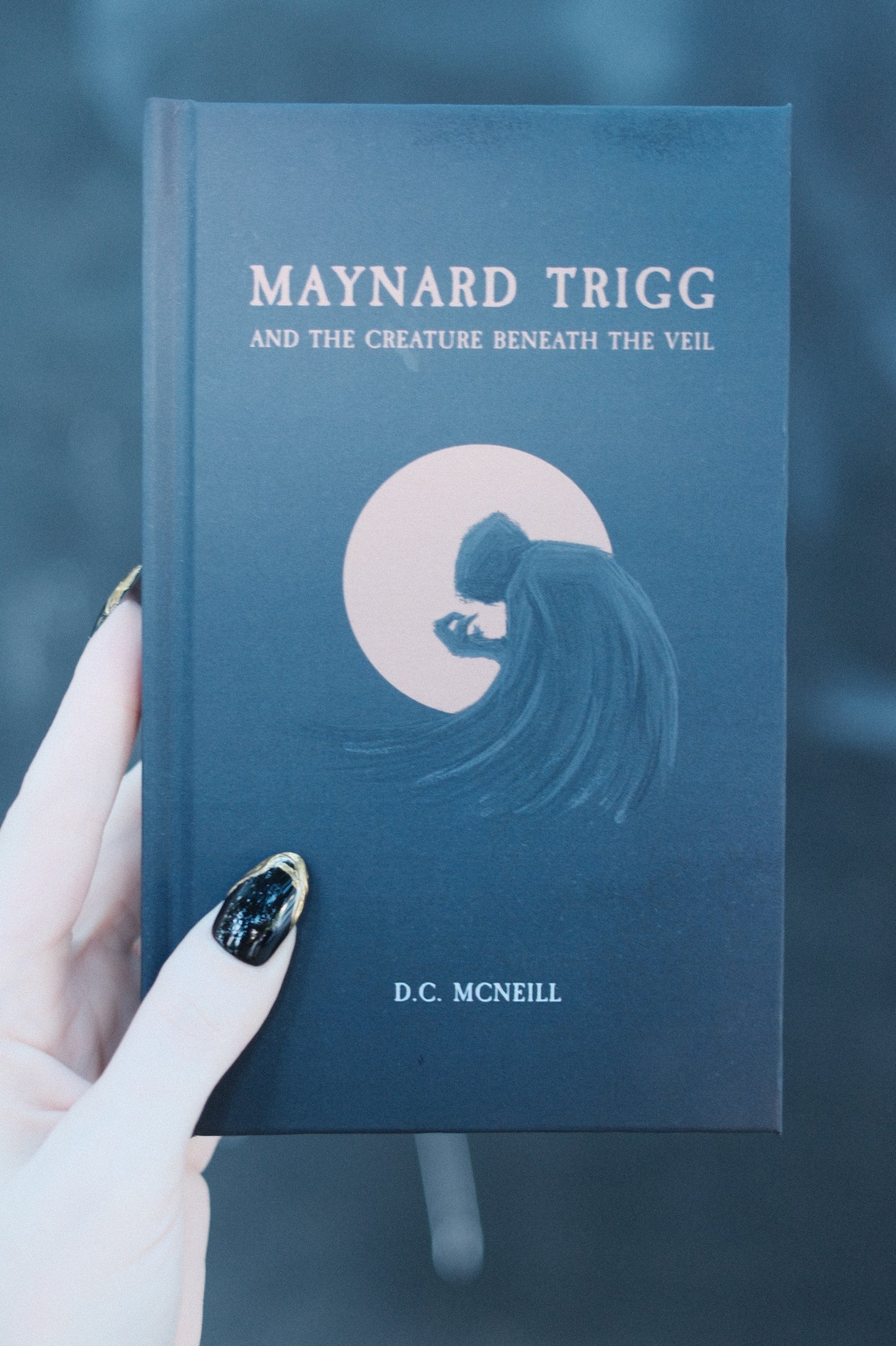 Maynard Trigg and The Creature Beneath The Veil